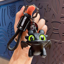 Load image into Gallery viewer, How to Train Your Dragon Merch - Night Fury Dragon Keychain Glow in the Dark Mini Dragon Pendant with Moving Wings - Trendy Bag Charm Car Ornament Keychain Gift
